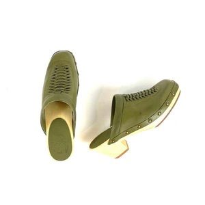 Vintage inspired olive gray clog with brass details.